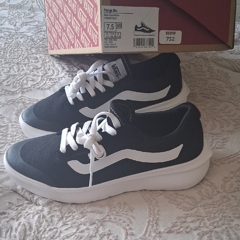 Vans Women's Black and White Sneakers